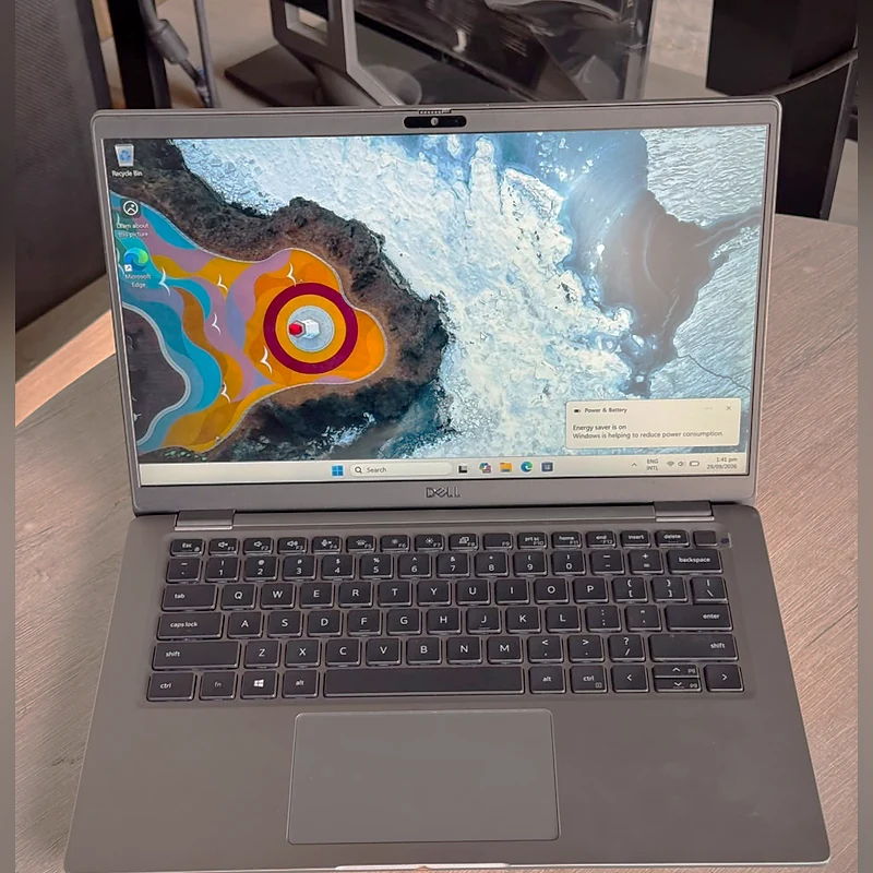 Dell Latitude 7410 Silver Used Dell Latitude 7410 in silver, open front view with backlit keyboard
