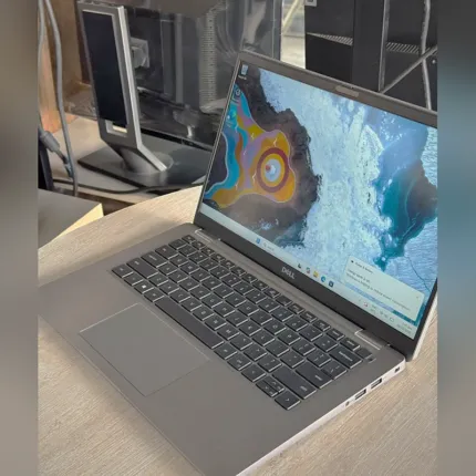 Dell Latitude 7410 silver keyboard and touchpad, angled view